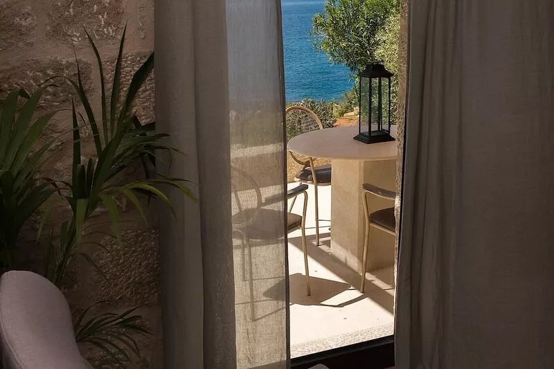 Enjoy the relaxation of chic seaside living in a sea view stone villa