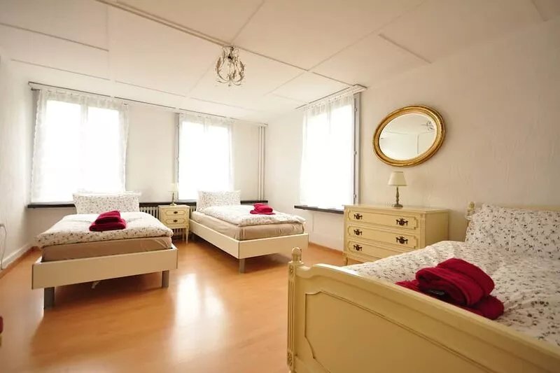 Newly Renovated 4 bedroom apartment.  3 mins to Interlaken.  Sleeps 12. Balcony
