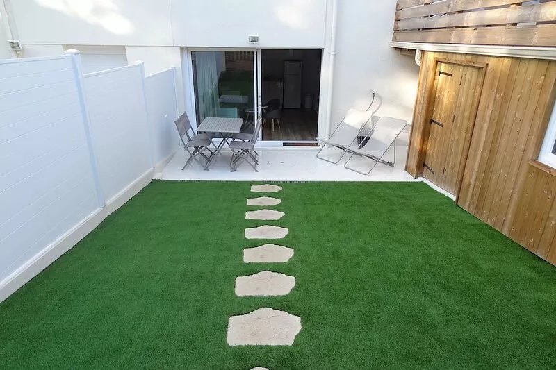Pleasant apartment with garden and private parking