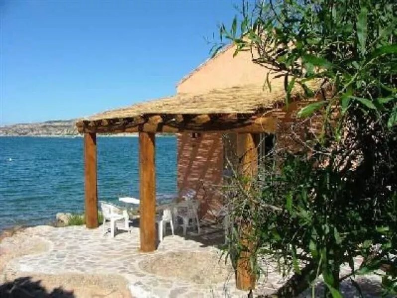 Villa 1 mt sea in private pine forest