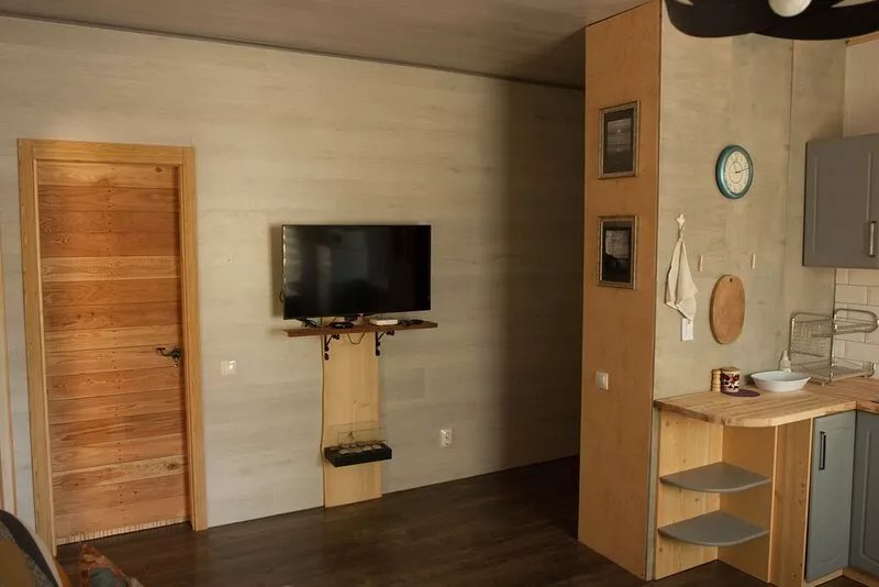 Apartment with a cozy terrace and a view of the pine trees