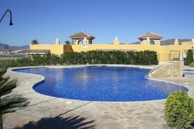 Charming and spacious ground floor apartment with own gardens and shared pool