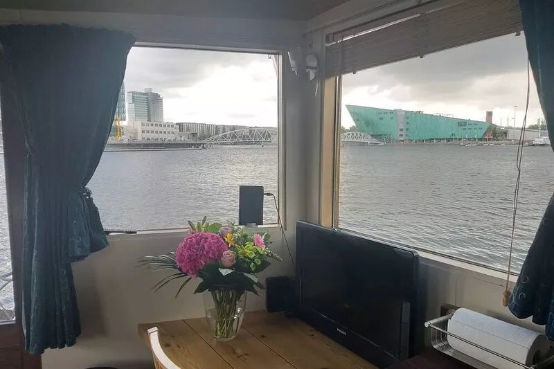 Boat with a view in center of Amsterdam