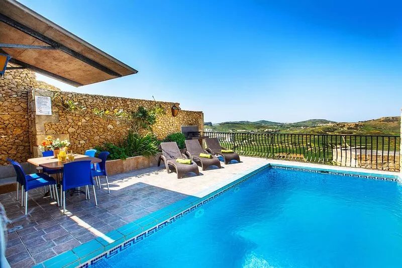 Sunny farmhouse with spectacular views , all bedrooms ensuite, private pool.