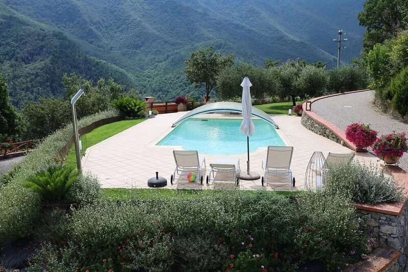 First floor villa with heated pool and garden