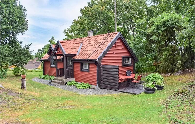 Small cozy cottage with terrace on a beautiful plot.