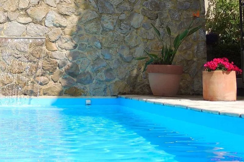 A character stone house with private heated swimming pool.