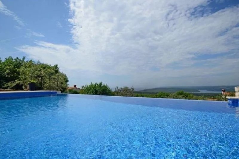 Traditional Istrian house with a nice garden, pool and sea view