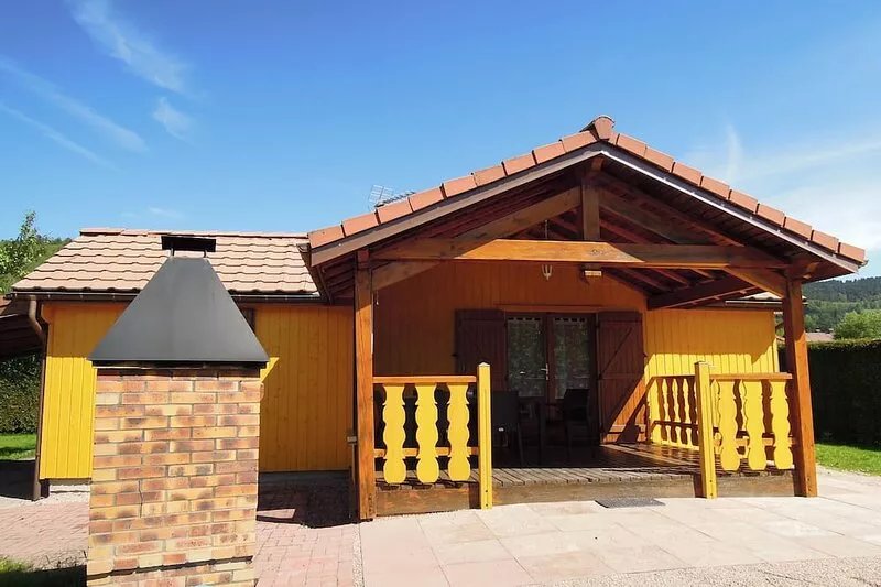Fenced cottage rental with barbecue and children's play area