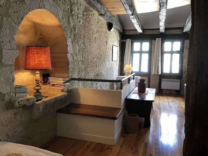 In a listed village, half-timbered house overlooking a wooded valley