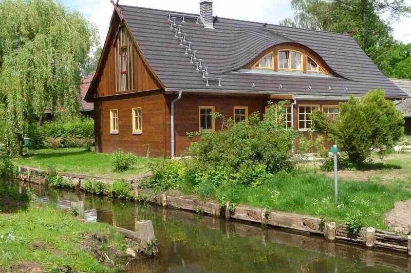 Enjoy the terrace directly situated at the waterfront/water/stream, sit  in