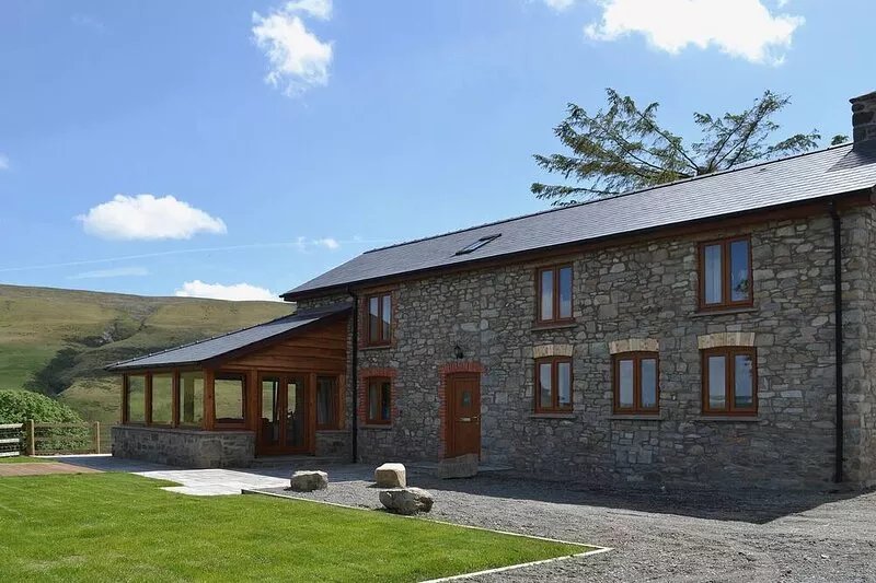 A rural Welsh property restored to a very high quality with fine views of the