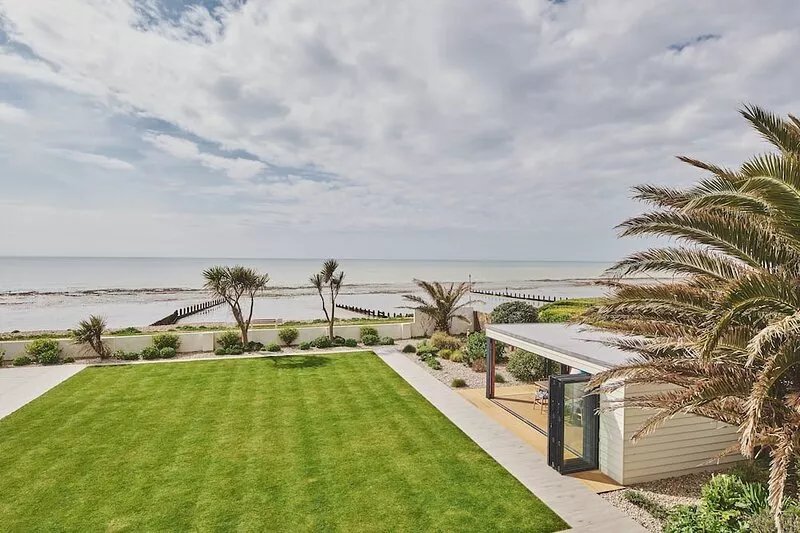 Superb beach house with beautiful garden with hot tub and private beach access