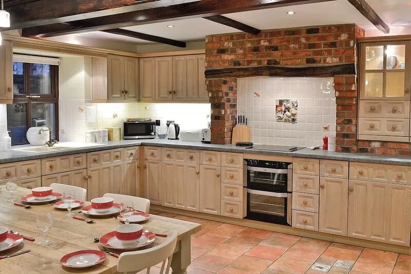 Kick back and relax in front of the cosy wood burner at this delightful barn