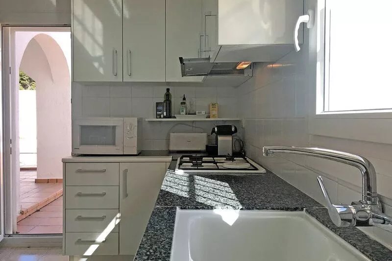 Town villa with Wi-Fi and pool only 350m from the beach, pet friendly!