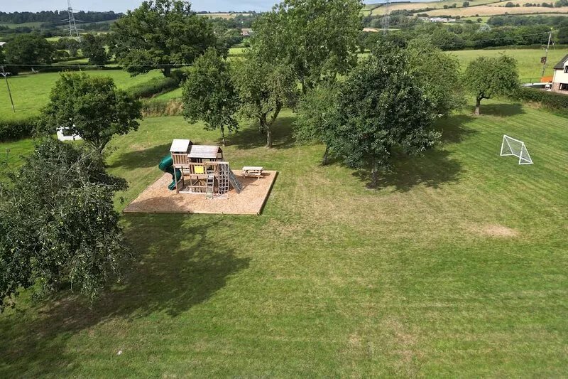 Devon Holiday Home with Hot Tub, Play Area, Games Room and Country Views.