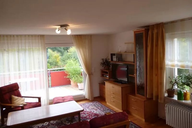 Bright top floor apartment on the 2nd floor with a large south-facing terrace