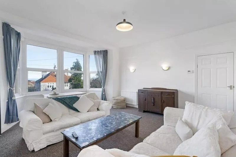 Bright Apartment w/ Parking & Distant Sea Views