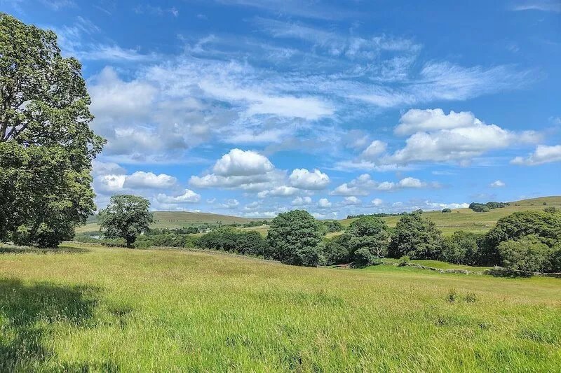 Stone built barn conversion with cosy living spaces and stunning fell views.