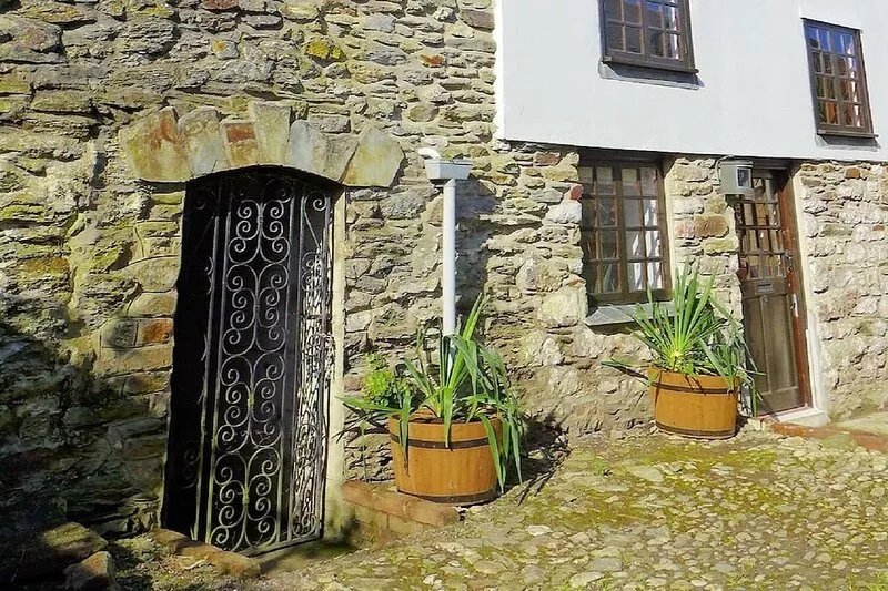 4 Capt Uptons Cottages.  Central but secluded.  Fast Wifi. Top floor sea views.