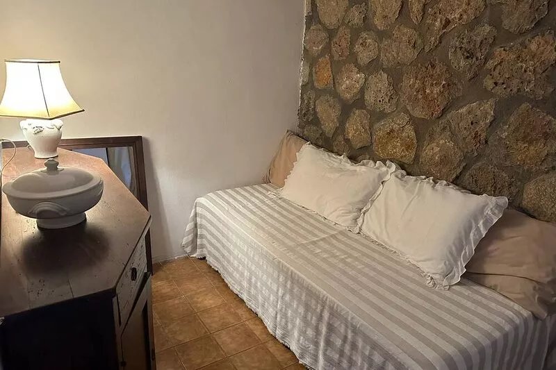 Cala Piccola, house with access to swimming pool and private beach.