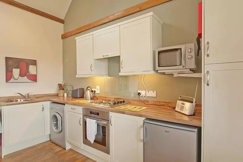 A cosy and quaint barn conversion with period features and views across to