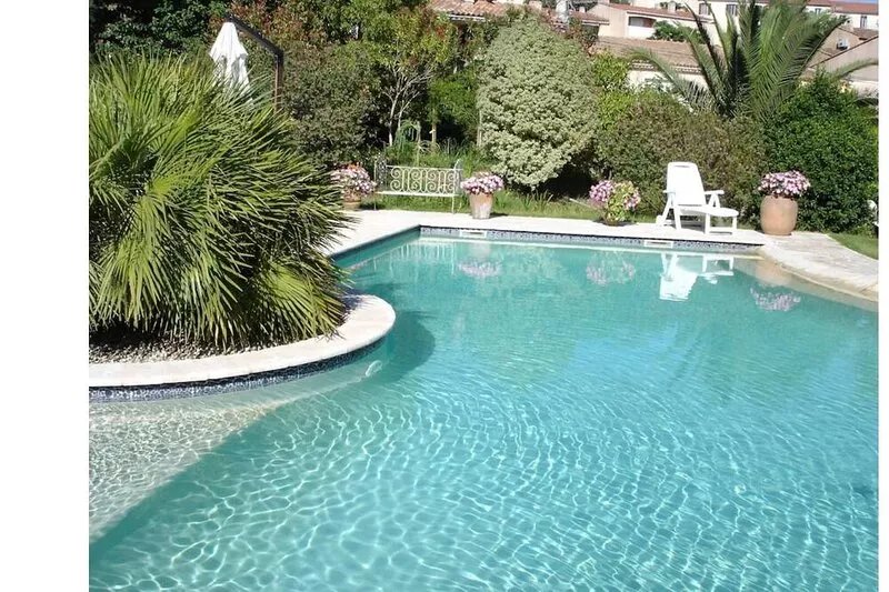 Modern villa with swimming pool and private garden,