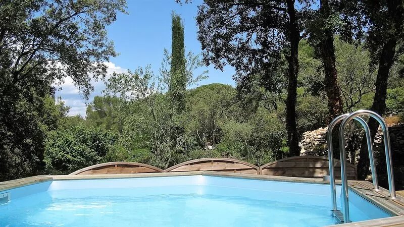 House all in wood and in color, with private swimming pool and garden