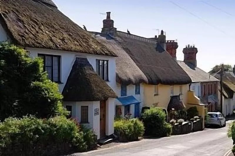 Shepherds Patch Is A Large Thatched Cottage In Thurlestone with a parking space.