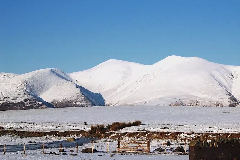 A 17th century cottage nestling in the foothills of the Skiddaw range.