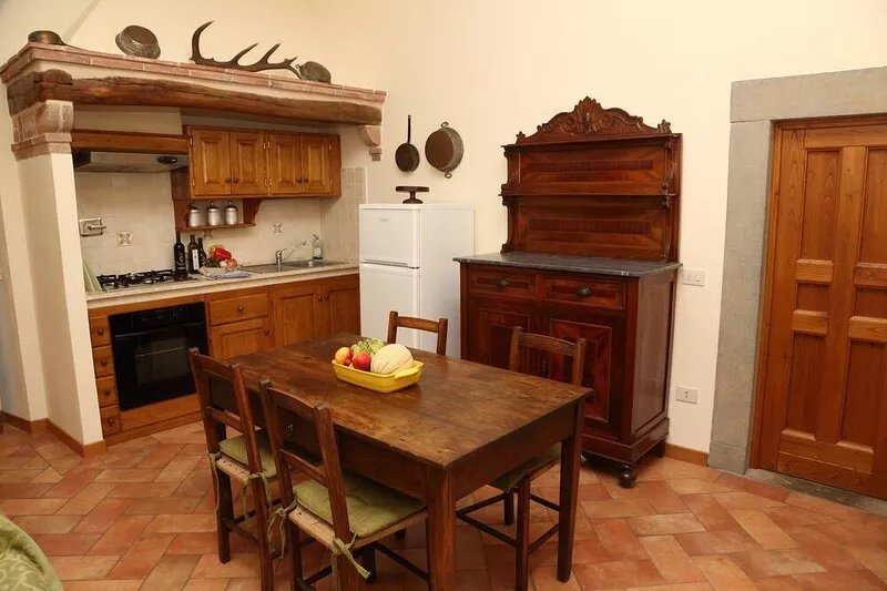 Two-room apartment in old villa with pool located between Lucca and Florence