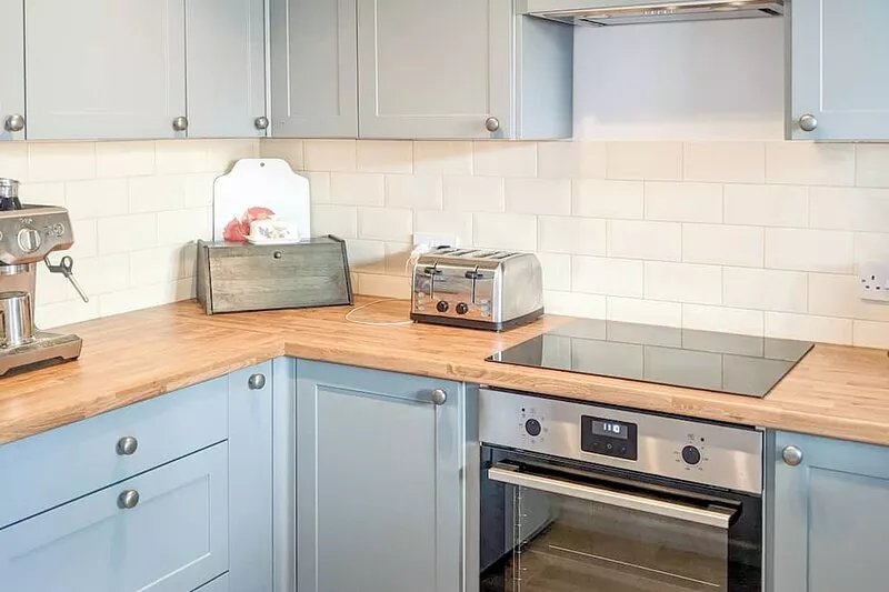 In a quiet mews development with parking, and just a short walk from the town
