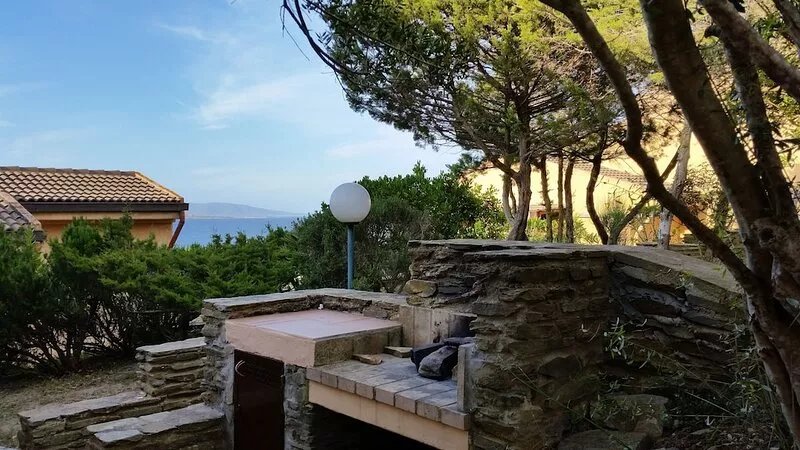 Apartment with garden near the beach in Stintino