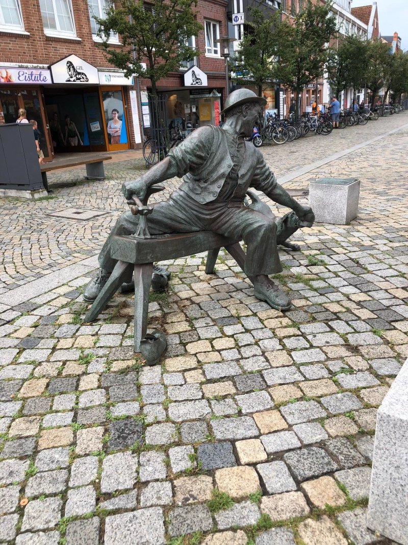 Schuster mit Hund