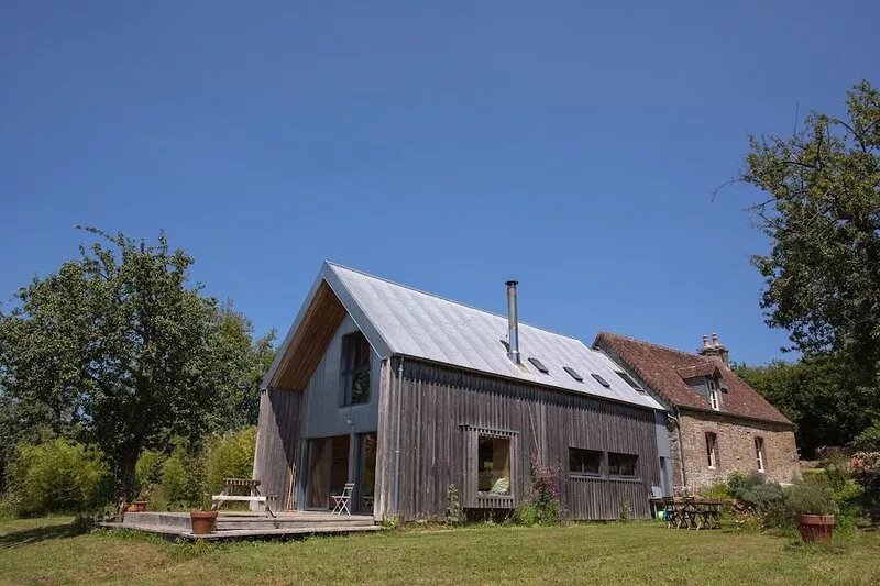 In the Normandy countryside, charming wooden architect's house.