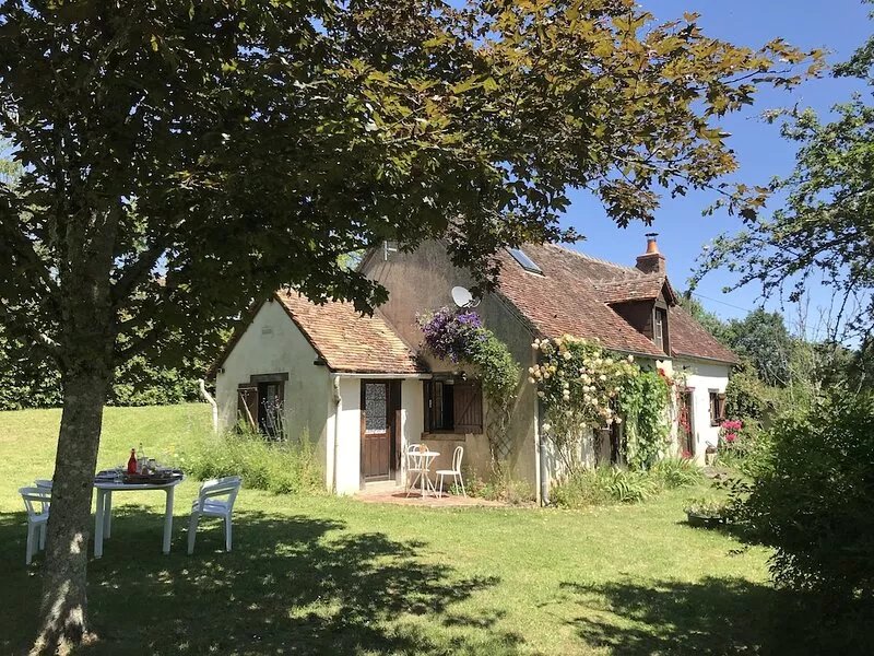 Private detached stone house overlooking a lake