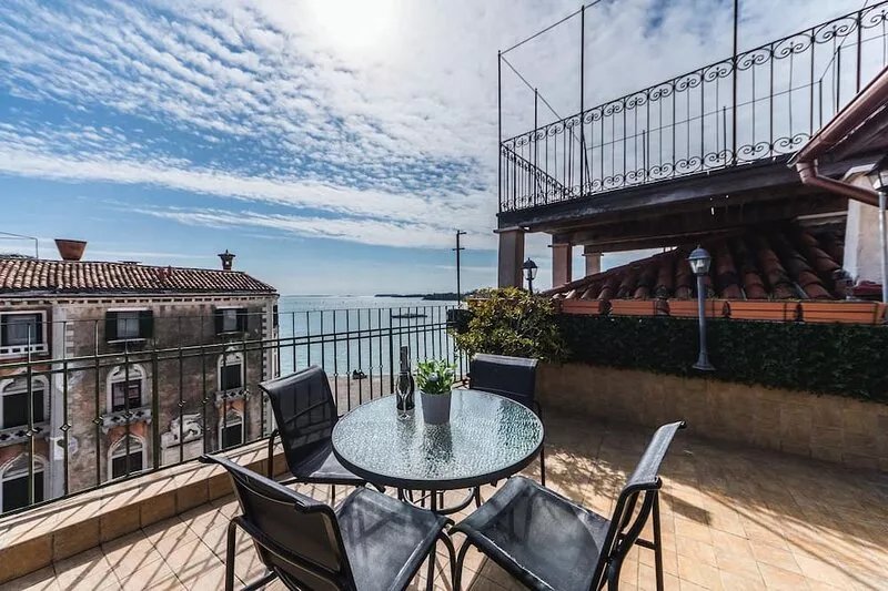 BIANCIAL PENTHOUSE WITH SPLENDID TERRACE SOLARIUM OVERVIEW OF THE LAGOON