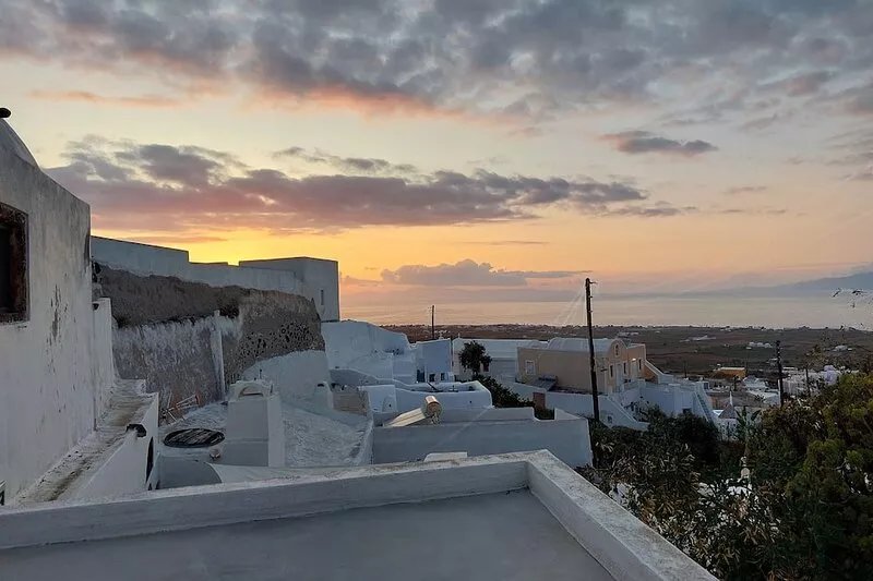 House of the Seven Ships. Cycladic traditional house with sea and sunset view