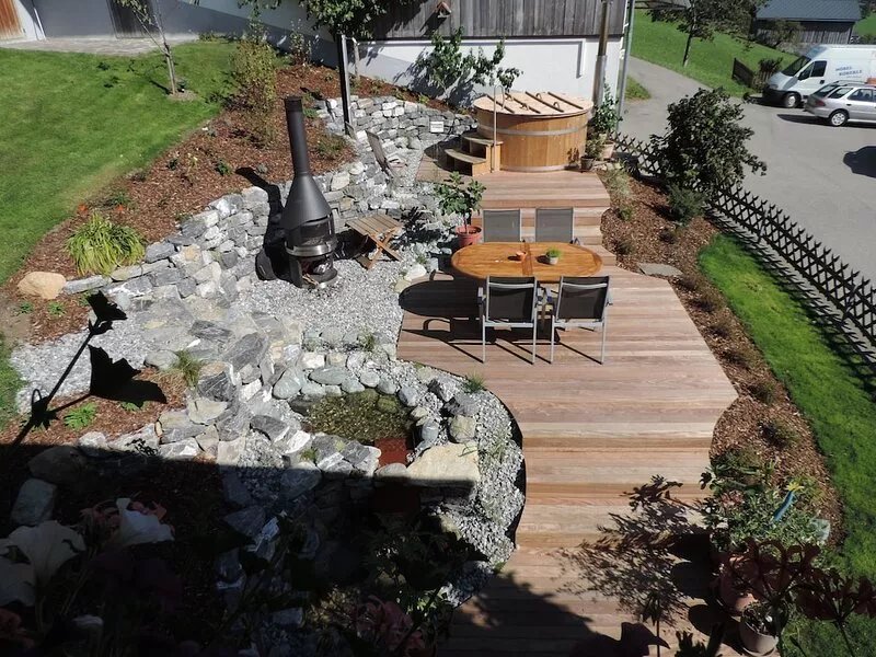 Living and relaxing on a sunny slope with a magnificent view of the mountains.