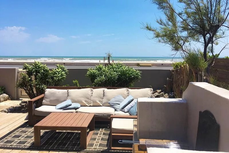 COZY, GARDEN, FACING THE SEA AND FEET IN THE SAND