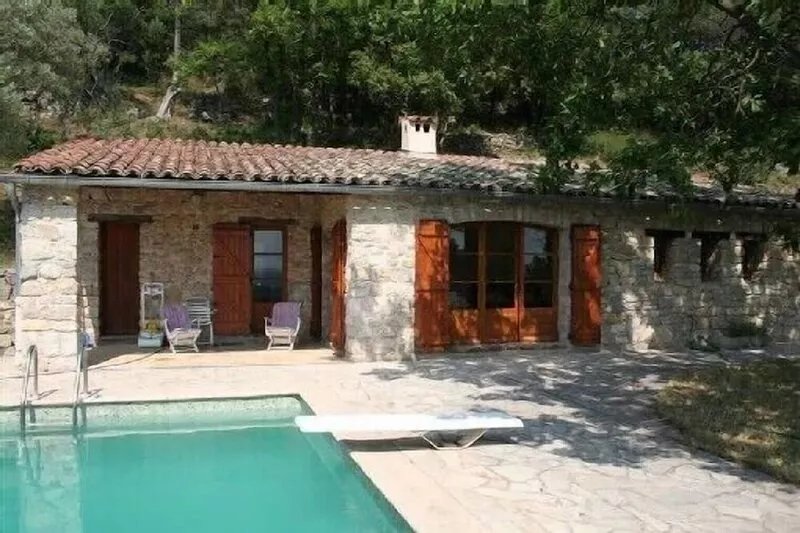 A haven of peace in a wild setting with an olive grove garden pool