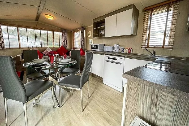 Lovely caravan with decking & free WiFi at North Denes Caravan Park ref 40145ND