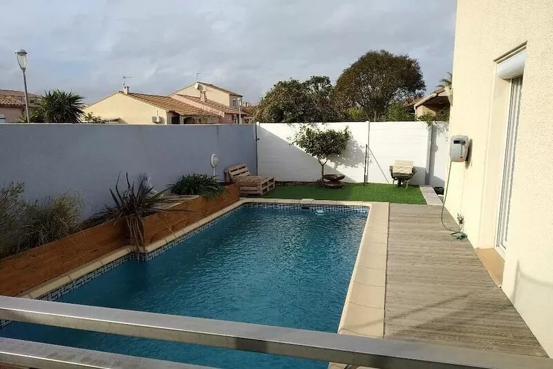 House with pool near the beach and shops