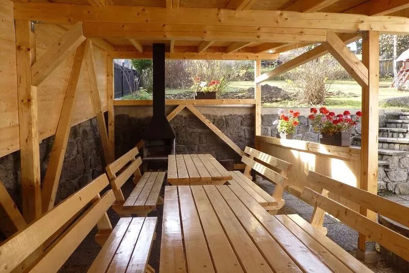 Holiday home with wood-burning fireplace situated on a slope