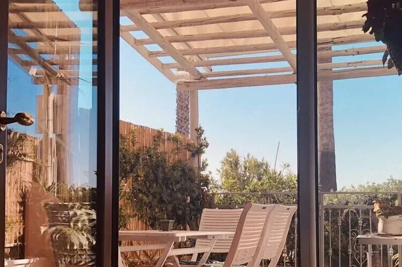 FIRST LINE SEA EDGE GROUND FLOOR-LIVING AND FURNISHED PATIO-CHARMING RESIDENCE