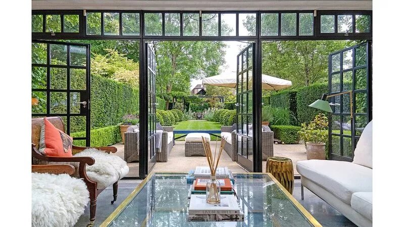 Luxury architect-designed 4 bed house with landscaped gardens moments from tube.
