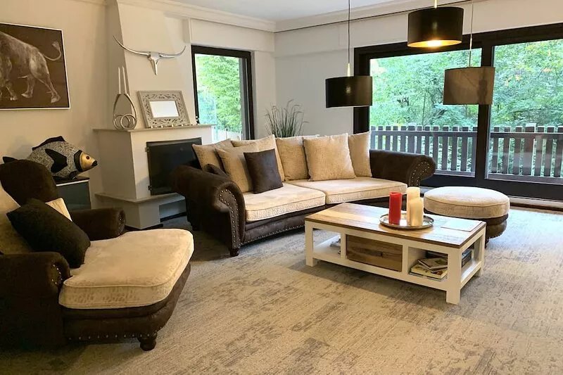 Large apartment with three bedrooms, living room, kitchen, dining room, garden