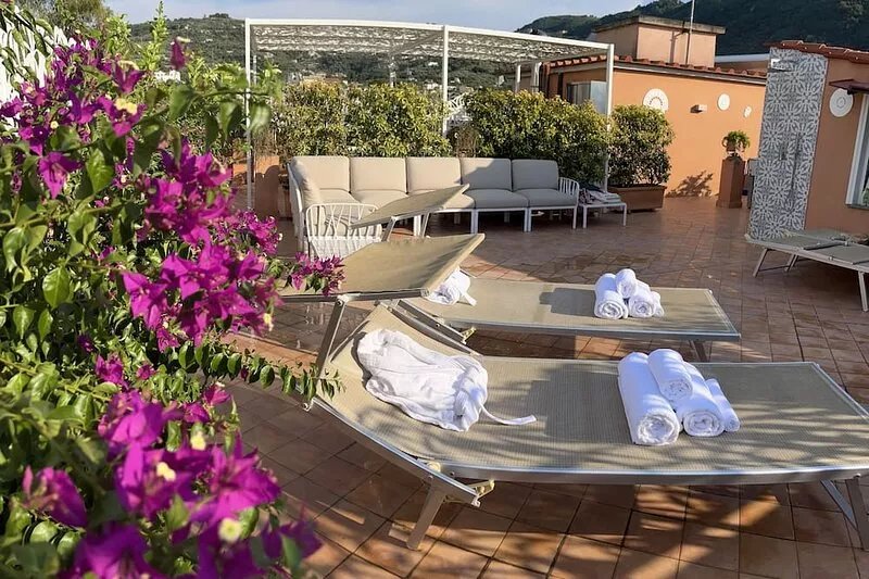 Two Double rooms with private bathrooms and an equipped roof terrace.