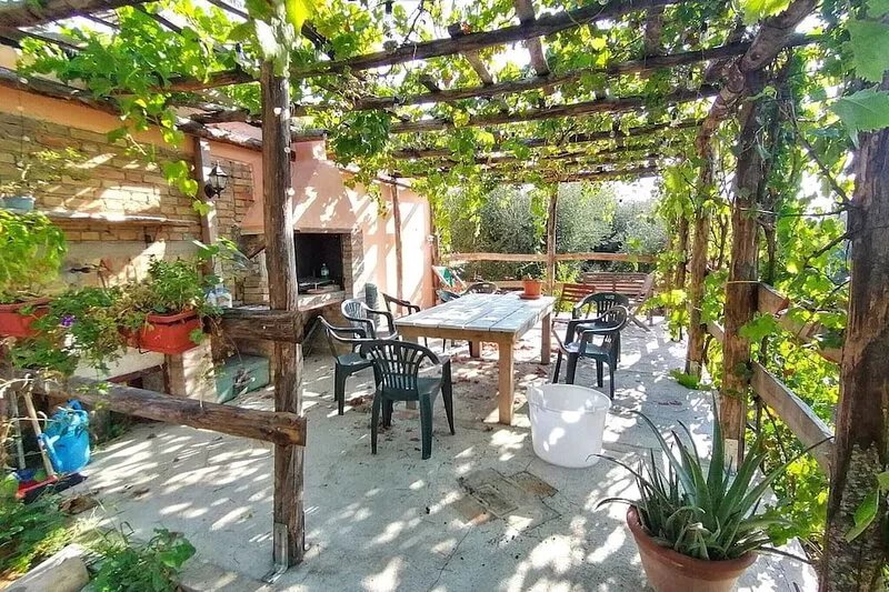 Cosy house in a small borgo surrounded by Italian olive orchards w mountain view