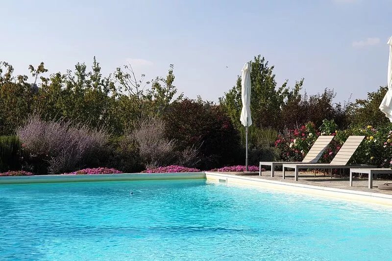 Spacious apartment in beautifully renovated property with shared pool and garden
